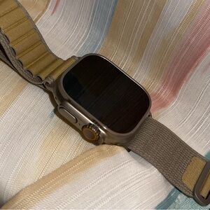 Smartwatch with Gray and Gold Accents